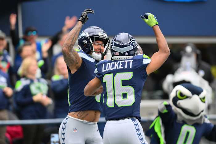 Jaxon Smith-Njigba (left) and Tyler Lockett